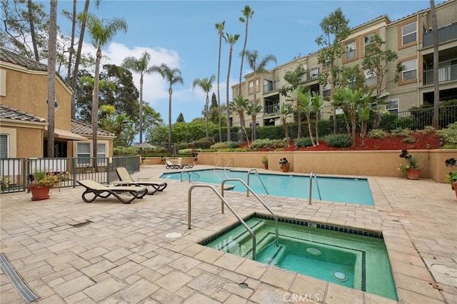 3408 Hathaway Ave Unit 301, Long Beach, CA 90815 - community pool featuring a community hot tub and a patio area