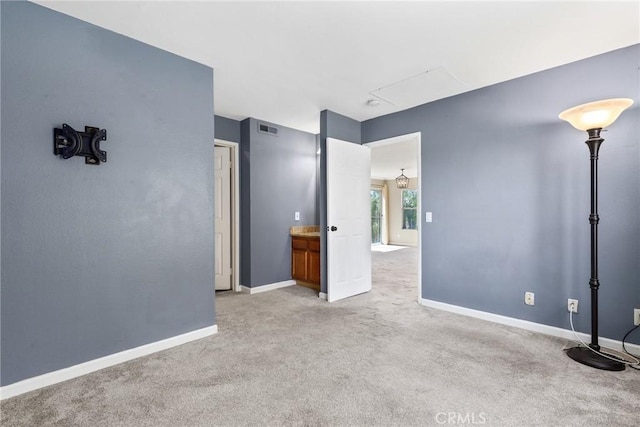 3408 Hathaway Ave Unit 301, Long Beach, CA 90815 - empty room with light colored carpet, baseboards, and attic access