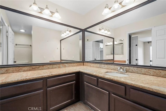 3408 Hathaway Ave Unit 301, Long Beach, CA 90815 - bathroom with vanity and tile patterned floors