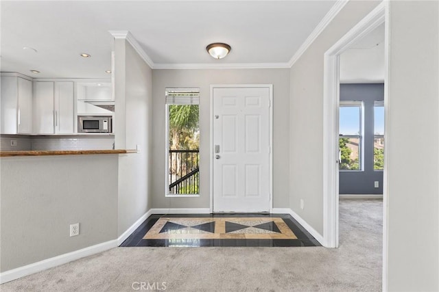 3408 Hathaway Ave Unit 301, Long Beach, CA 90815 - carpeted entryway featuring baseboards, plenty of natural light, inlaid floor details, ornamental molding, and recessed lighting