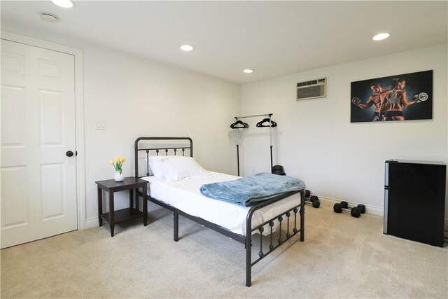 10629 El Este Ave, Fountain Valley, CA 92708 - bedroom featuring light colored carpet, a wall mounted air conditioner, and recessed lighting