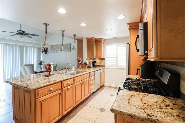 10629 El Este Ave, Fountain Valley, CA 92708 - kitchen featuring stainless steel range with gas cooktop, a peninsula, a sink, white dishwasher, and light tile patterned floors