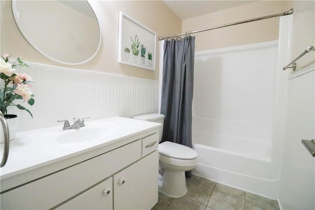 10629 El Este Ave, Fountain Valley, CA 92708 - bathroom with a wainscoted wall, toilet, shower / tub combo, tile patterned flooring, and vanity
