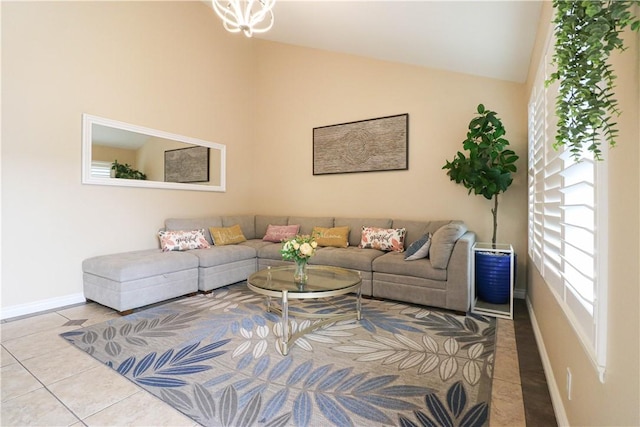 10629 El Este Ave, Fountain Valley, CA 92708 - tiled living room featuring high vaulted ceiling and baseboards