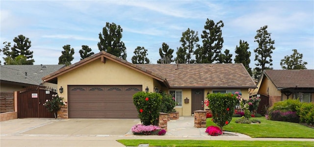 10629 El Este Ave, Fountain Valley, CA 92708 - ranch-style home with an attached garage, driveway, a front lawn, and stucco siding