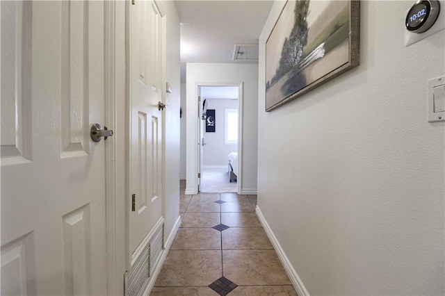 10629 El Este Ave, Fountain Valley, CA 92708 - hallway with baseboards, visible vents, and light tile patterned floors