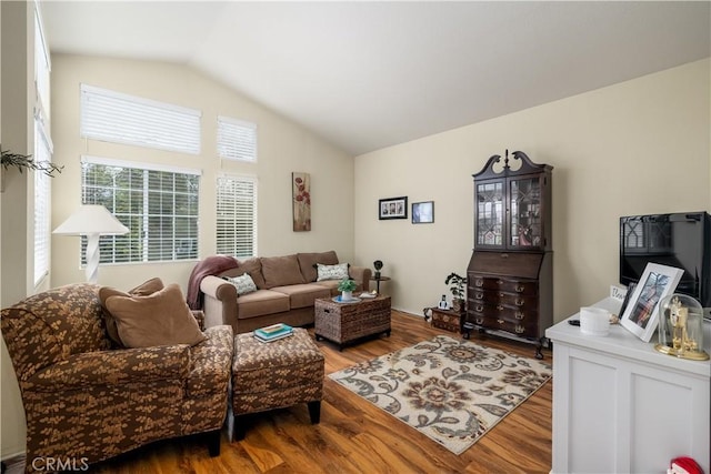 27191 Ryan Dr, Laguna Niguel, CA 92677 - living room featuring vaulted ceiling and wood finished floors