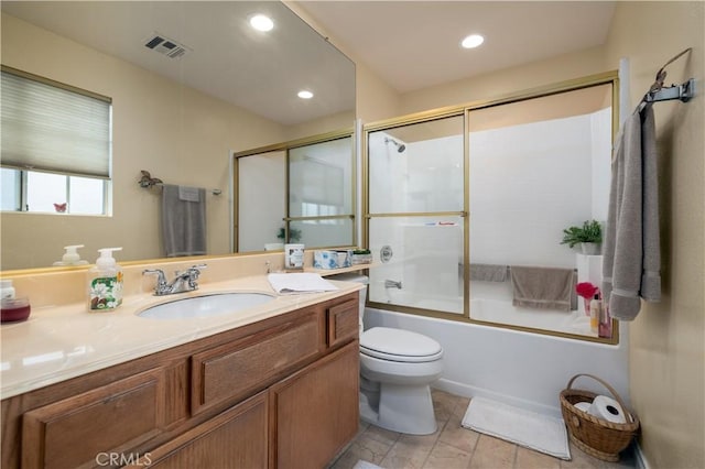 27191 Ryan Dr, Laguna Niguel, CA 92677 - bathroom with vanity, bath / shower combo with glass door, toilet, visible vents, and recessed lighting