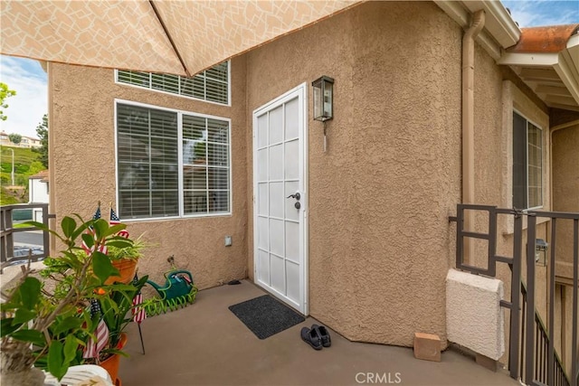 27191 Ryan Dr, Laguna Niguel, CA 92677 - doorway to property featuring stucco siding