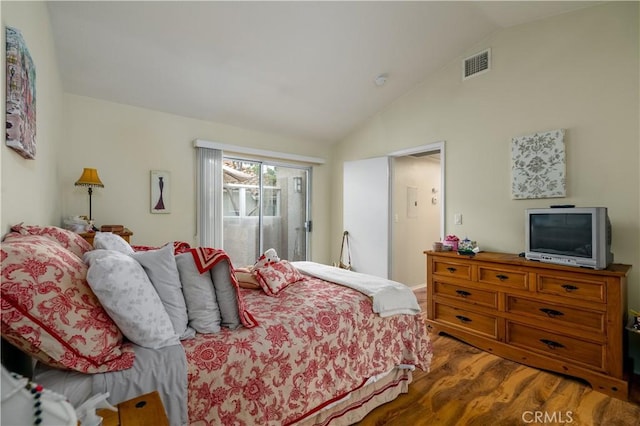 27191 Ryan Dr, Laguna Niguel, CA 92677 - bedroom with lofted ceiling, wood finished floors, and visible vents