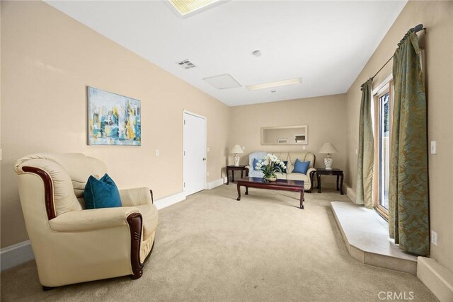 2700 Holly Ave, Arcadia, CA 91007 - living room with baseboards, visible vents, and light colored carpet