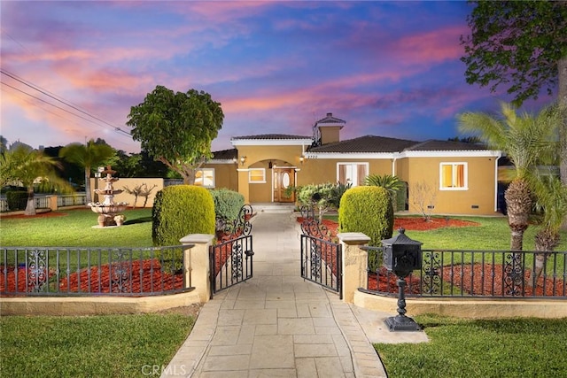2700 Holly Ave, Arcadia, CA 91007 - single story home with a tiled roof, a fenced front yard, a gate, a front yard, and stucco siding