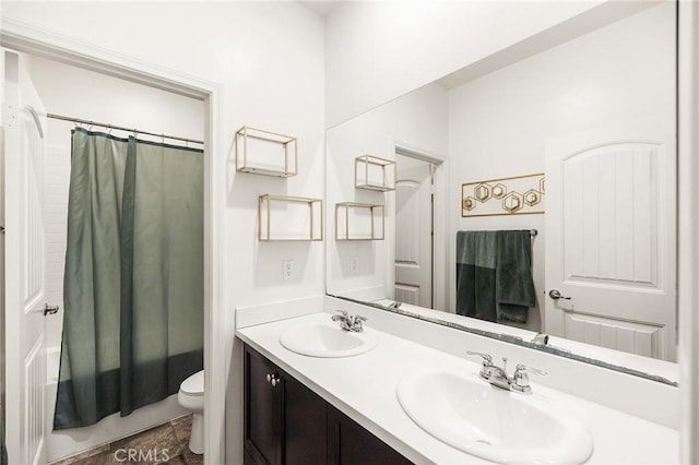 full bathroom featuring toilet, double vanity, and shower / tub combo