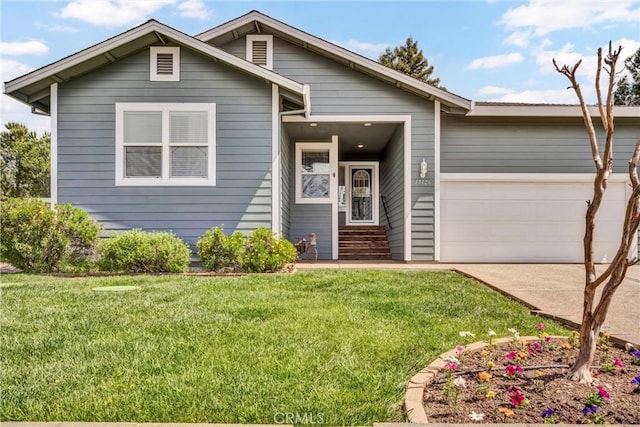 17126 Squirrelhill Rd, Hidden Valley Lake, CA 95467 - view of front facade featuring an attached garage, driveway, entry steps, and a front lawn