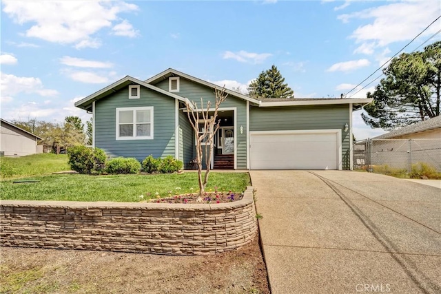 17126 Squirrelhill Rd, Hidden Valley Lake, CA 95467 - view of front of home with a garage, driveway, a front yard, and fence