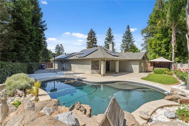 689 E Pintail Cir, Fresno, CA 93730 - view of pool with a fenced backyard, a gazebo, a patio, and a fenced in pool
