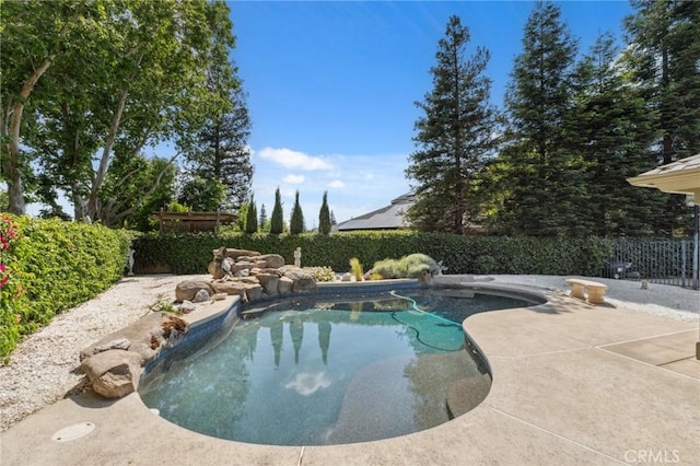689 E Pintail Cir, Fresno, CA 93730 - view of pool with a fenced backyard, a patio area, and a fenced in pool