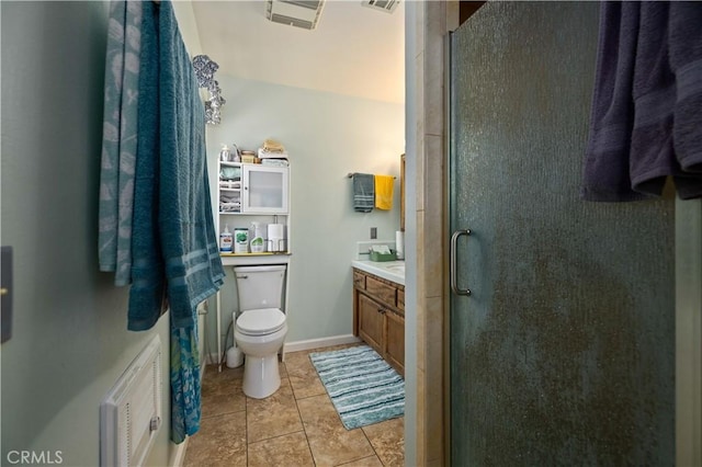 full bathroom with tile patterned floors, toilet, visible vents, a shower stall, and vanity