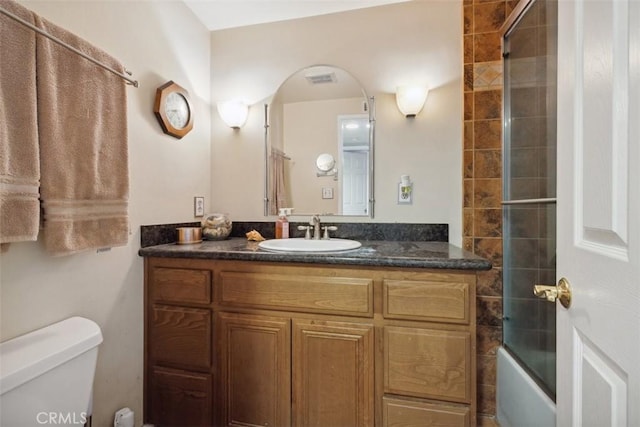 1675 Bridget Ave, Simi Valley, CA 93065 - full bathroom featuring toilet, vanity, and bath / shower combo with glass door