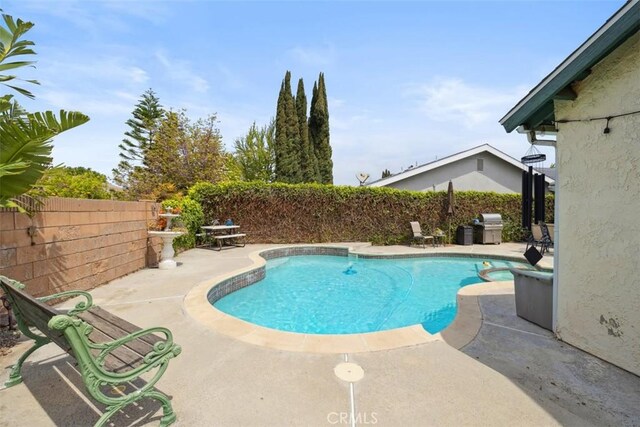 1675 Bridget Ave, Simi Valley, CA 93065 - view of swimming pool featuring a patio area and a fenced backyard