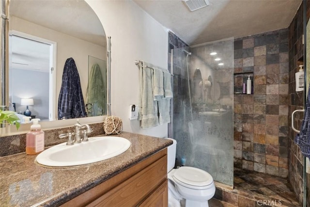 1675 Bridget Ave, Simi Valley, CA 93065 - full bathroom with tiled shower, vanity, and toilet