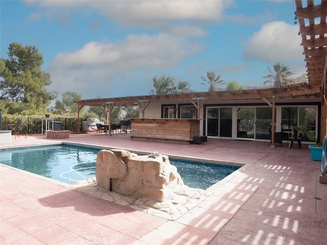 view of pool featuring a pergola, a fenced in pool, and a patio