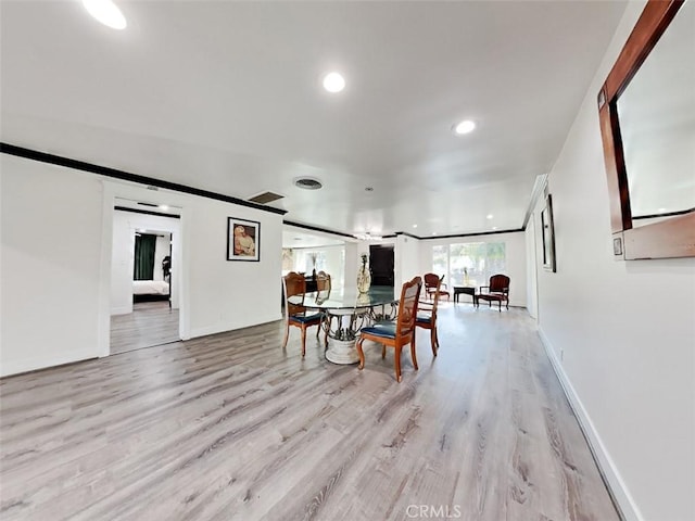 dining area with recessed lighting, light wood-style flooring, visible vents, and baseboards