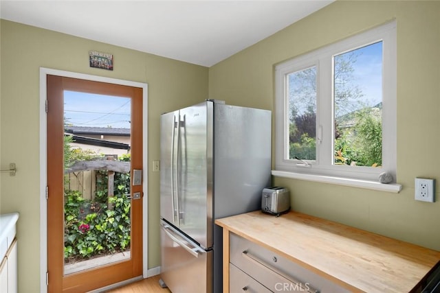 doorway to outside featuring plenty of natural light