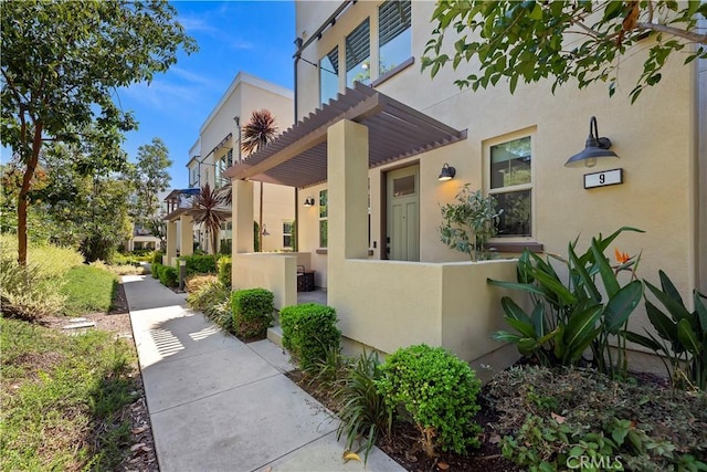 9 Adelfa St, Rancho Mission Viejo, CA 92694 - doorway to property featuring stucco siding