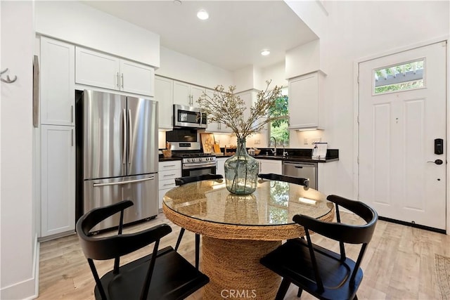 9 Adelfa St, Rancho Mission Viejo, CA 92694 - dining room with recessed lighting, a wealth of natural light, and light wood finished floors