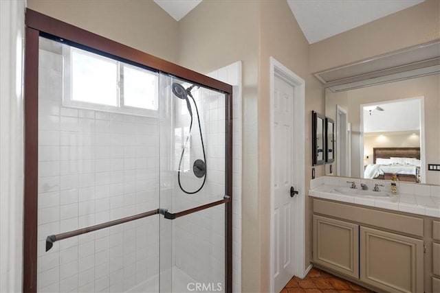 full bathroom featuring ensuite bath, vanity, and a stall shower