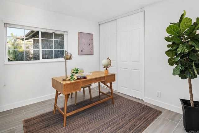 6770 Amberly St, San Diego, CA 92120 - office featuring baseboards and wood finished floors