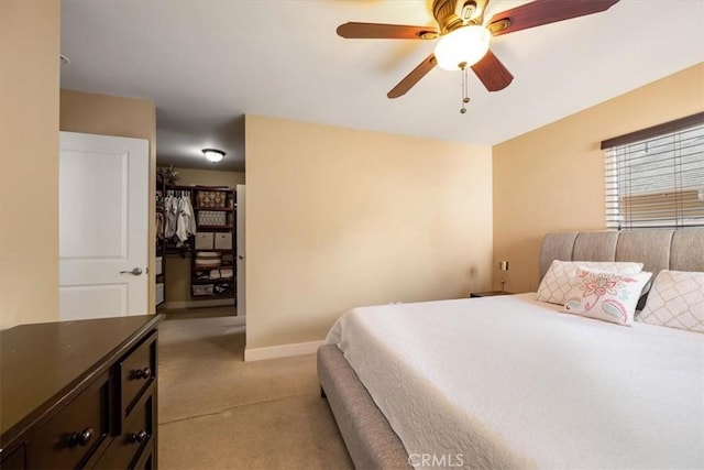 2103 Price St, San Luis Obispo, CA 93401 - bedroom with ceiling fan, baseboards, and light carpet