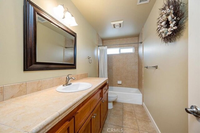2103 Price St, San Luis Obispo, CA 93401 - bathroom featuring tile patterned floors, toilet, bathtub / shower combination, baseboards, and vanity