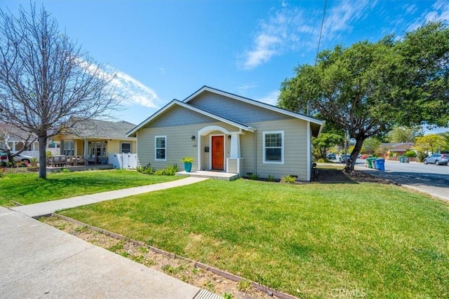 2103 Price St, San Luis Obispo, CA 93401 - bungalow-style house featuring a front yard