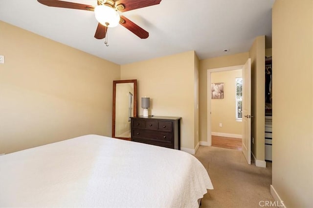 2103 Price St, San Luis Obispo, CA 93401 - bedroom featuring light colored carpet, ceiling fan, and baseboards