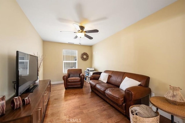2103 Price St, San Luis Obispo, CA 93401 - living area with light wood finished floors, a ceiling fan, and visible vents