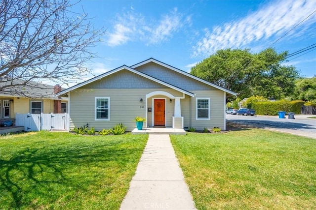2103 Price St, San Luis Obispo, CA 93401 - bungalow-style home featuring a front lawn and fence