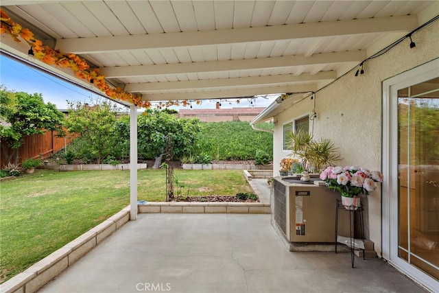 view of patio with central AC and a fenced backyard