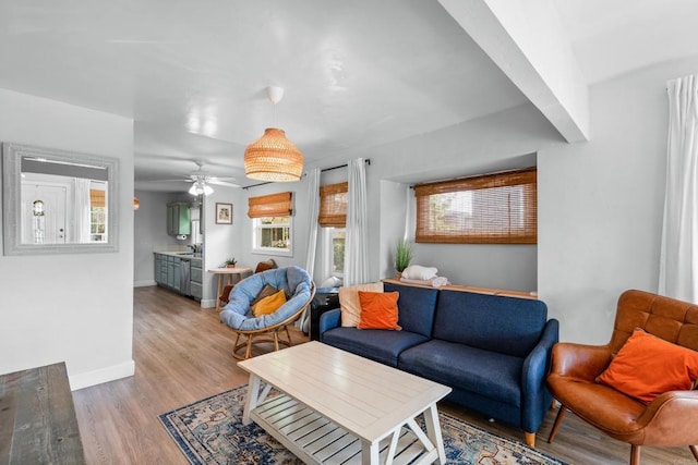 376163 Swift Ave, San Diego, CA 92104 - living room featuring healthy amount of natural light, wood finished floors, and baseboards