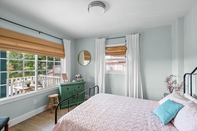 376163 Swift Ave, San Diego, CA 92104 - bedroom featuring wood finished floors and baseboards