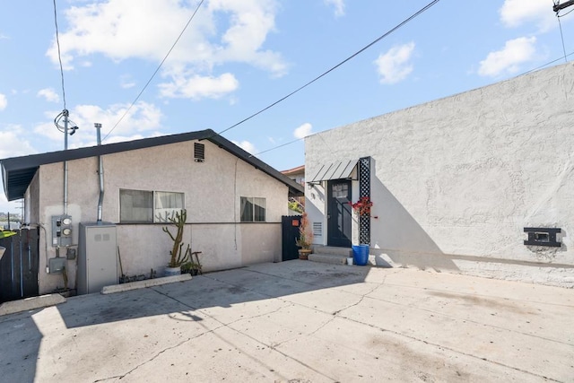 376163 Swift Ave, San Diego, CA 92104 - back of house featuring stucco siding and a patio