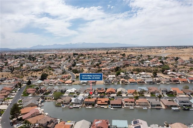 aerial view featuring a residential view and a mountain view