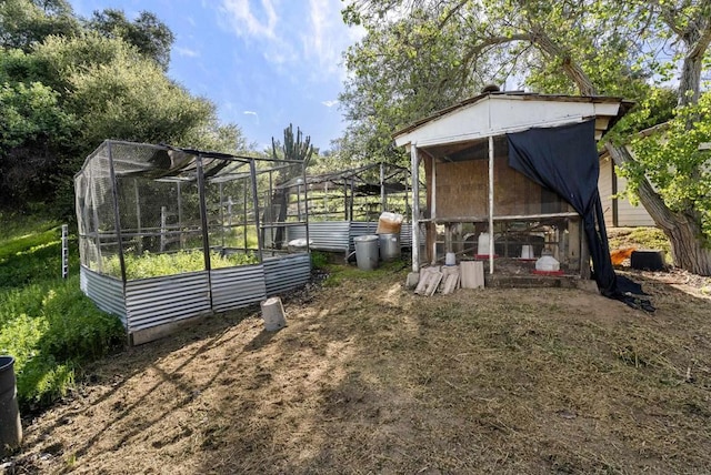 exterior space featuring exterior structure and an outdoor structure