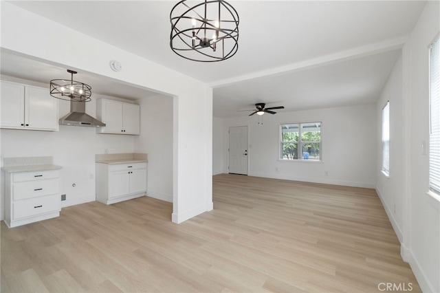 1559 N Carruth Ave, Fresno, CA 93728 - unfurnished living room featuring baseboards and light wood finished floors
