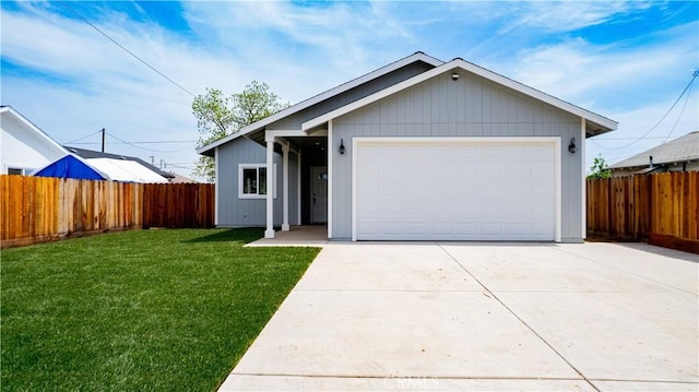 ranch-style home with concrete driveway, a front lawn, and fence
