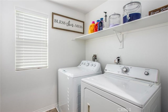 laundry area featuring independent washer and dryer and laundry area