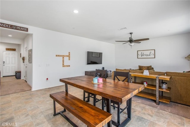 dining area featuring a ceiling fan, stone finish flooring, baseboards, visible vents, and recessed lighting