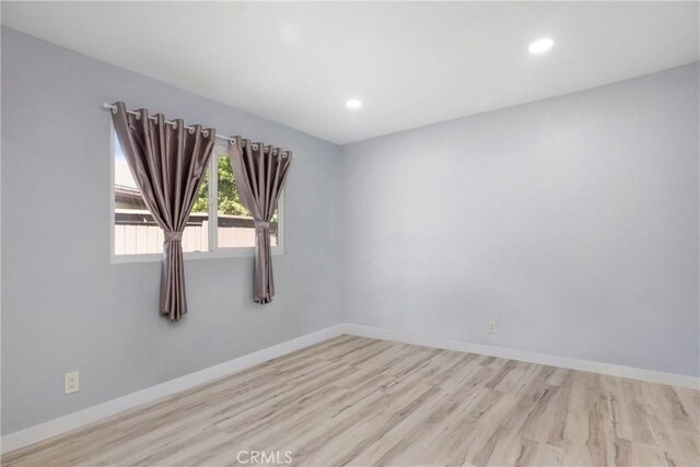 13261 Coast St, Garden Grove, CA 92844 - unfurnished room featuring wood finished floors, baseboards, and recessed lighting