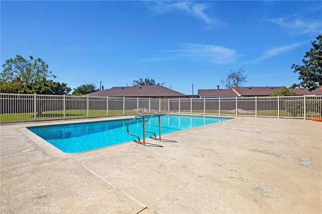13261 Coast St, Garden Grove, CA 92844 - view of swimming pool with a patio area